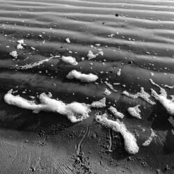 © PhilK Ecume sur la plage